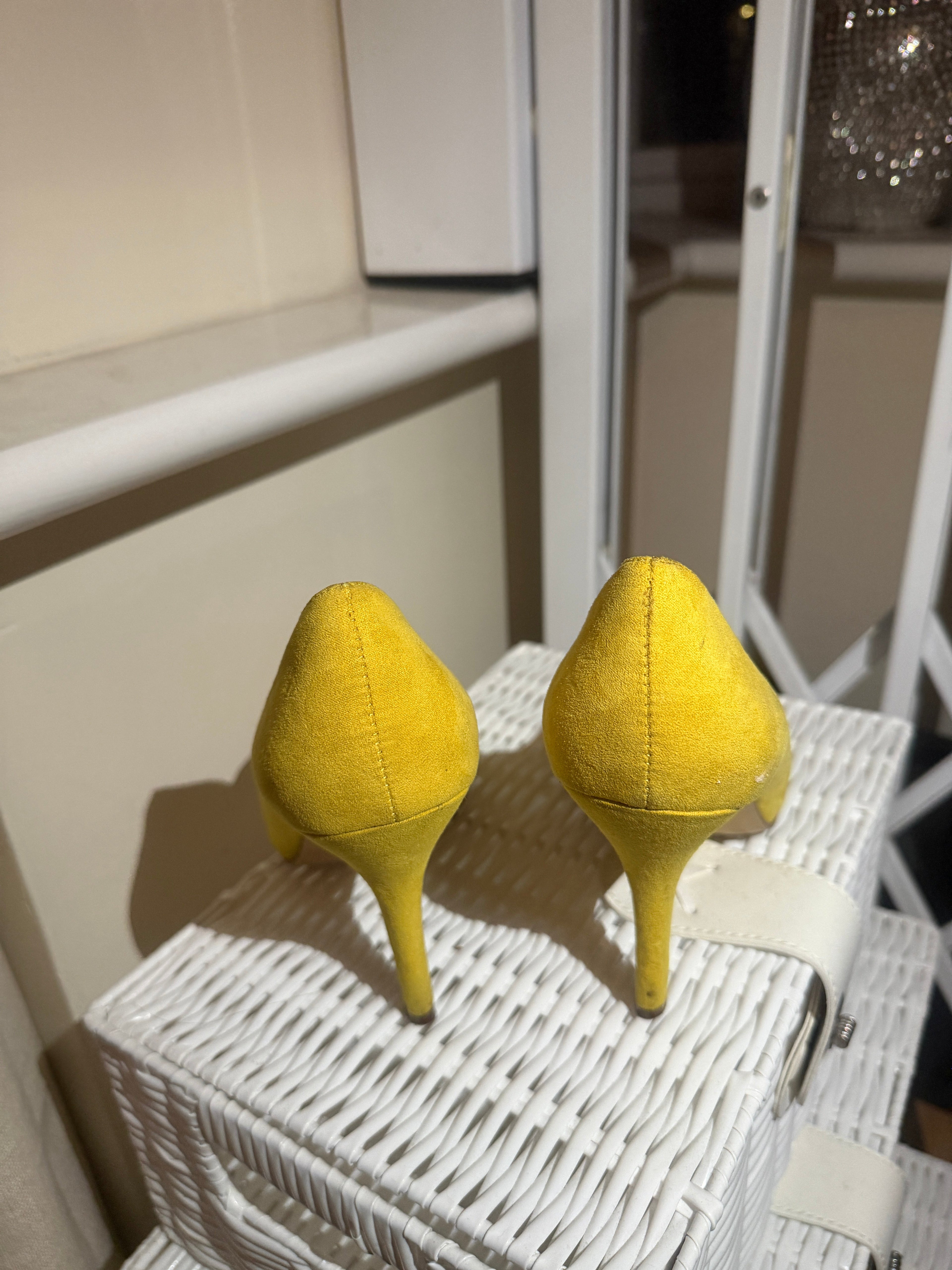 Nine West yellow suede stiletto heels - back view
